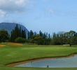 The par-4 17th on the Lakes nine on the Makai Course features a green guarded in front by water. 