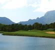 The par-4 third hole plays 407 yards to a green over water at Puakea Golf Course.