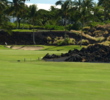One of the most picturesque holes at the Waikoloa Resort Beach Course is the par-4 fifth, which plays around a large lava formation.