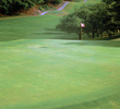 The green of the par-4 11th hole at The Dunes at Maui Lani GC requires a 70-foot, uphill shot. 