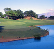 The Dunes at Maui Lani Golf Course's par-4 fifth hole features water down the left side.  