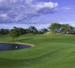 The Dunes at Maui Lani Golf Course's sixth hole showcases some of the property's barren dunesland in the background. 