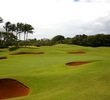 Kauai Lagoons Golf Club's 4th green is surrounded by bunkers and mounding. 