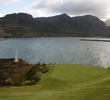 Kauai Lagoons Golf Club's 16th green is drivable off the tee but most balls kick left into the ocean. 