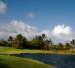 The par-3 17th hole at Kauai Lagoons Golf Club plays over water. 