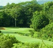 The par-4 13th hole on the Prince Course at Princeville resort is cut through dense jungle. 