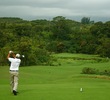 The opening tee shot on the Prince Course at Princeville resort isn't easy: a fairway cut through hazards on each side. 