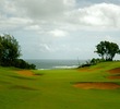 The par-4 sixth hole on the Prince Course at Princeville resort tumbles down towards the ocean into the trade winds. 
