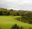 The green on the par-5 15th hole sits next to jungle on the Prince Course at Princeville resort. 