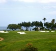 Makai Golf Club's long, par-3 13th hole plays over 200 yards into the tradewinds.