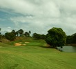 Puakea Golf Club's par-4 12th hole is guarded on the right by water.