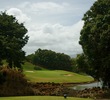 Puakea Golf Club's par-3 13th hole is a demanding shot to a green guarded by water on the right.