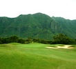 The dogleg left 17th hole at Puakea Golf Club plays back towards the mountains.