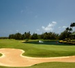 The par-5 18th hole at Poipu Bay Golf Course plays back off the coast toward the clubhouse. 