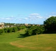 After a downhill 10th, the par-4 11th hole at the Dunes at Maui Lani Golf Course plays uphill to an elevated green. 