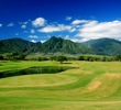 The 18th hole at the Dunes at Maui Lani Golf Course is a long par 5 that plays to a green guarded by water. 