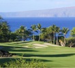 The par-4 fourth hole on the Emerald Course at Wailea Golf Club plays downhill toward the ocean.