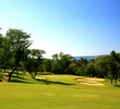 The first hole on the Gold Course at Wailea Golf Club is a downhill, dogleg left par 4. 
