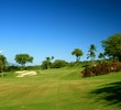 The par-3 third hole on the Gold Course at Wailea Golf Club features lava rock to the right of the green. 