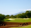 The 16th hole on the Gold Course at Wailea Golf Club is a par 3 that heads back toward the sea and West Maui Mountains. 