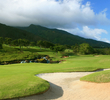 King Kamehameha golf course, a private club with member-for-a-day access, plays beside the West Maui Mountains. 