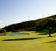 The 12th hole at Kahili G.C. is a par 5 that features a pond in front of the green. 