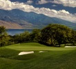 The seventh hole at Makena Golf Course is guarded in front by sand and a small creek. 