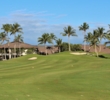 The 10th hole at Ko Olina Golf Club sweeps right toward an elevated green.