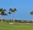The par-4 sixth hole of the Kings' Course at Waikoloa Beach Resort doglegs to the left. 