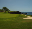 The par-3 seventh hole provides one of many dramatic views on the South Course at Mauna Lani Resort in Hawaii.