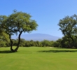 Kick a field goal between the trees to hit the third green of the Francis H. I'i Brown North golf course at Mauna Lani Resort.