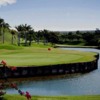 A view of green #18 surrounded by water at Makani Golf Club (Arsenio Lopez)