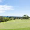 A sunny day view of a hole at Hawaii Kai Golf Course.