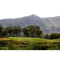 Kauai Lagoons Golf Club's par-3 fifth hole is a daring shot over a ravine. 