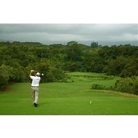 The opening tee shot on the Prince Course at Princeville resort isn't easy: a fairway cut through hazards on each side. 