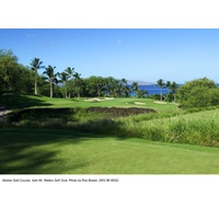 Considered the signature hole of the Gold Course at Wailea Golf Club, the eighth plays over lava rock down toward the ocean. 