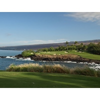 The signature par-3 third at Mauna Kea Golf Course on the Big Island can play as long as 270 yards.