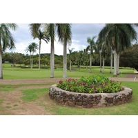 Don't over-club and land in the flowerbed behind the ninth green at Olomana Golf Links on Oahu. 