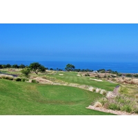 The 12th hole at Hapuna Golf Course provides panoramic ocean views of Hawaii's Kona Coast.